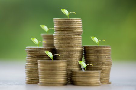 Money coin stack growing graph for saving concept. business finance and saving money investment, plant growing up on coin. Balance savings and investment. save retirement for interest ideaの写真素材