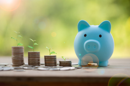 Money coin stack growing graph with piggy bank saving concept. business finance and saving money investment, plant growing up on coin. Balance savings and investment. save retirement for interest ideaの写真素材
