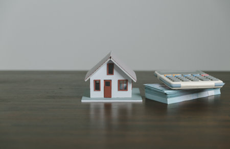 Interest rate financial and mortgage rates concept. Saving money for real estate, home and living. Applying for loans and giving loans from banks.の写真素材