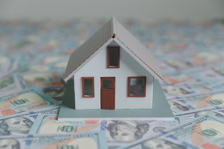 Interest rate financial and mortgage rates concept. Saving money for real estate, home and living. Applying for loans and giving loans from banks.の写真素材