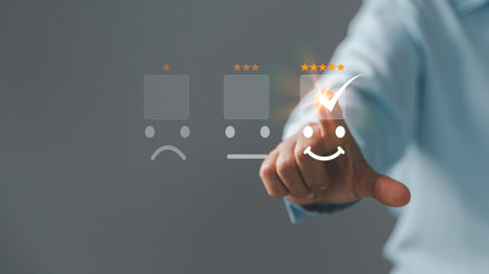 Customer service and Satisfaction concept, Five star consumer feedback. Business people are touching virtual screen on happy Smiley face icon to give satisfaction in service. rating very impressed.の写真素材