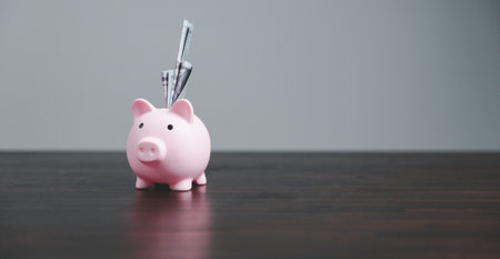 Saving investment banking finance concept. Stack of coins with piggy bank on the table. Growth of loan and investment business idea. Asset Management, Funds, Liabilities, Deposits, Income, Successful.の写真素材