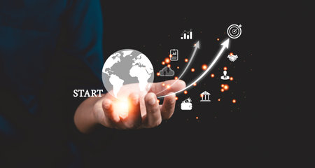 Startup concept with icon business and network connection on modern virtual interface from digital tablet. People hand touching on tablet. Developing and improving organization with modern technology.の写真素材