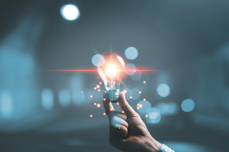 woman Hand holding Light bulb Global Internet connection. Business global internet connection application technology and digital marketing, Financial and banking, Digital link tech, big data.の写真素材