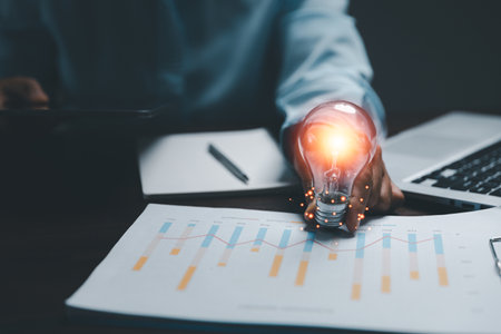 woman Hand holding Light bulb Global Internet connection. Business global internet connection application technology and digital marketing, Financial and banking, Digital link tech, big data.の写真素材