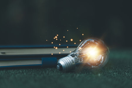 Bright light bulb and icon with book. Business success idea and education or learning online concept. Business person achievement and inspiration. technology, Create Imagination for Inspiration.の写真素材