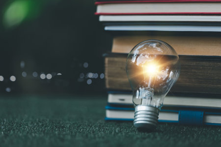 Bright light bulb and icon with book. Business success idea and education or learning online concept. Business person achievement and inspiration. technology, Create Imagination for Inspiration.の写真素材