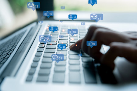 Freelance woman using laptop computer for marketing or playing social media and website, Social network technology concept.の写真素材