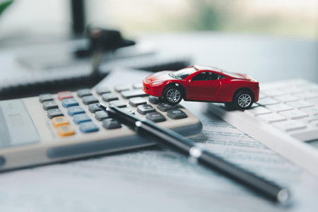 Insurance claim accident car form, Car loan, insurance and leasing time. Planning to manage transportation finance costs. Concept of car insurance business, saving buy with tax and loan for new car.の写真素材