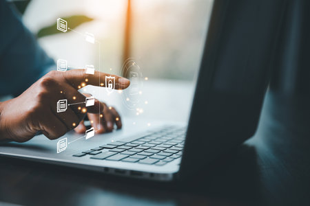 Concept of online document management technology. Businesspeople manage corporate databases through cloud, cyberspace technology and large, paperless archives of important, file and online storage.の写真素材