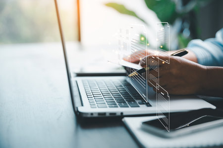Concept of online document management technology. Businesspeople manage corporate databases through cloud, cyberspace technology and large, paperless archives of important, file and online storage.の写真素材