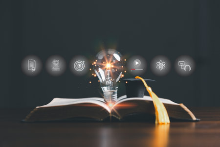 Lightbulb on book with education e-learning icons, Internet education course degree, study knowledge to creative thinking idea and solving solution. E-learning graduate certificate program concept.の写真素材