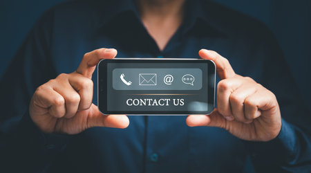 Woman hand using smart phone, Contact us connection concept. Contact us or Customer support hotline...