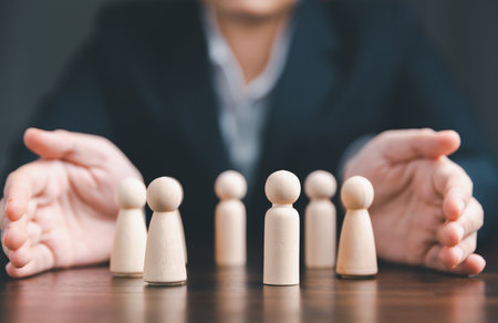 Manager chooses and hiring team for business success. HR manager hand or Employer chooses takes in hand employee. Leader stands out from crowd. Looking for good worker. HR, HRM, HRD conceptsの写真素材