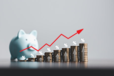 Stacked coins on wooden table with illustration shows increasing of interest rates, financial concept. Interest rate financial and mortgage rates. Icon percentage symbol and arrow pointing up.の写真素材