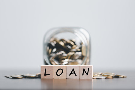 Car, house, personal money loan concept. finance business icon on wooden cube. saving money for a...