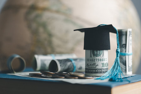 Graduation cap with Earth globe. Concept of global business study, abroad educational, Back to School. Education in Global world, Study abroad business in universities in worldwide. language studyの写真素材