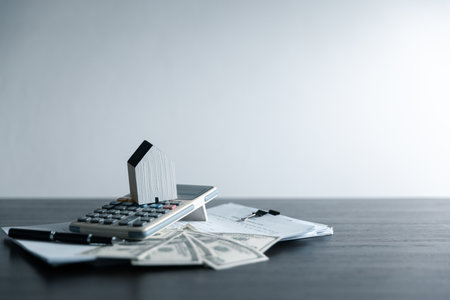 Efficiently manage your finances at home with a strategic money plan, ensuring solid foundation for financial stability. Explore art of budgeting, saving, investing for a brighter financial future.の写真素材