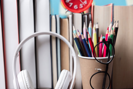 Kids desk creative workspace with school supplies, notebooks. Back to school concept. watercolor...