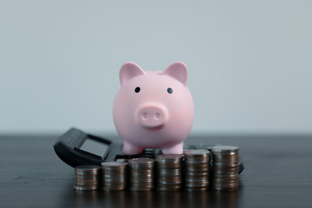 Piggy bank with business stuff, business and finance concept, saving money wealth and financial concept, Business, finance, investment, Financial planning.の写真素材