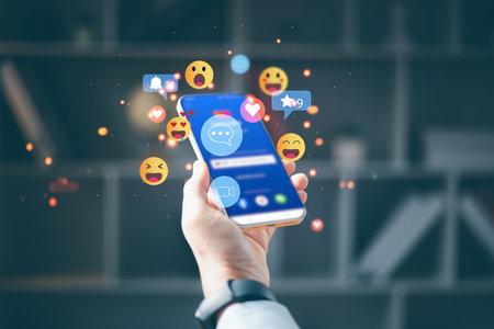 Woman hand using smartphone and show technology icon social media. Concept social network. hand using mobile smartphone with icon social media and social network. Online marketing concept.の写真素材