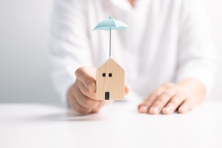 Home insurance provides security and protection for your house, property, and mortgage, ensuring your business and financial investments are taken care of. insurance, protect, care, home, house, loanの写真素材