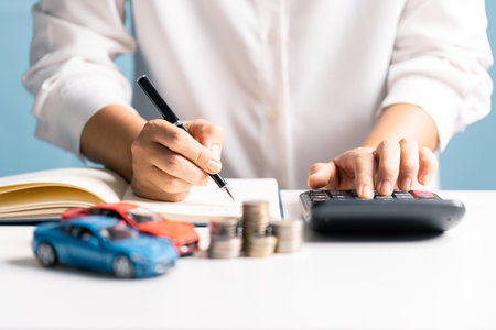 Saving money and managing coins wisely can help finance the cost of a car loan through banking and business strategies when you decide to buy. money, car, saving, coin, finance, loan, cost, business.の写真素材