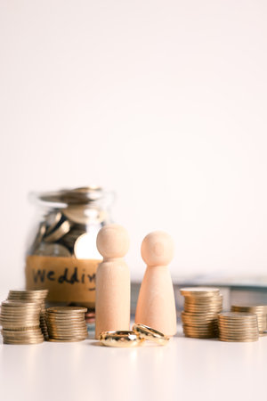 Couple invested their money in gold jewelry and managed their wedding finances carefully, using their wealth and cash savings to celebrate their engagement in style. money, couple, wedding, cash.の写真素材