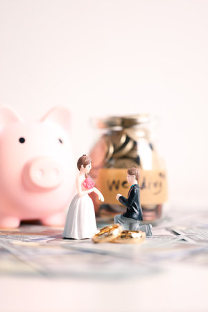 Couple invested their money in gold jewelry and managed their wedding finances carefully, using their wealth and cash savings to celebrate their engagement in style. money, couple, wedding, cash.の写真素材