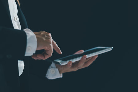 Person using smartphone navigates social media, seamlessly connecting through mobile technology and the vast network of cyberspace. social, media, phone, cyberspace, person, smartphone, mobile phone.の写真素材