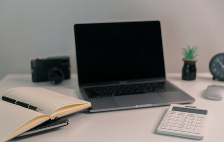 Remote work relies on technology, with employees using laptops and computers from home to communicate and conduct business online via network. comfortable, display, efficient, electronic, minimalist.の写真素材