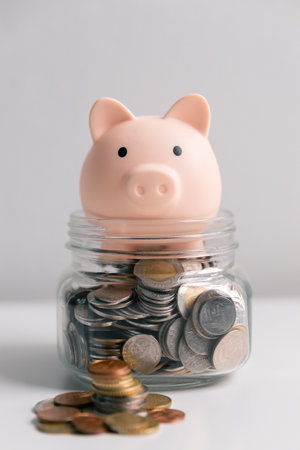 To effectively manage finance, one must save money, budget wisely, and deposit coins and currency into business banking account. pension, property, safety, sale, smart, treasure, toy, care, valueの写真素材