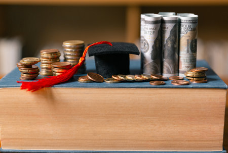 Investing in education abroad, saving coins and money, leads to financial growth, successful graduation, and future success. management, planning, stack, profit, prosperity, step, performance, secureの写真素材