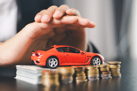 Concept business vehicle finance protection office plan investment buy sell car ensuring idea financial security. automobile agent hand protect purchase insurance and secure favorable loan deal.の写真素材
