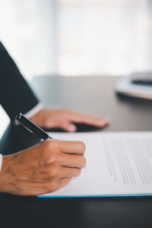 Business people signing contract making deal with life insurance agent Concept for consultant health insurance life insurance savings plan. Approved stamp with Business people contract making dealの写真素材