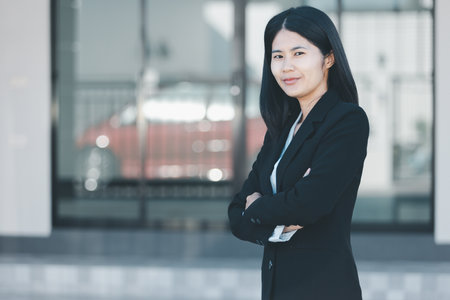 Woman hand hold key buy home model business concept involves sell financial management investment bank loan ownership economy finance investments purchasing apartment blur background estateの写真素材