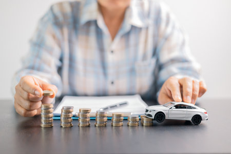 Concept businessman vehicle finance protection office plan investment protect hand save buy sell car ensuring idea financial security automobile agent purchase insurance secure favorable loan dealの写真素材