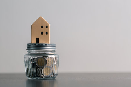 Business home concept involves strategic financial management money coin save bank real estate...