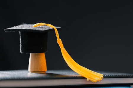 Concept education is business scholarship essential idea globalization, mortarboard students learn and study in universities and colleges master knowledge save involves financial management diplomaの写真素材