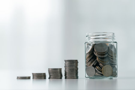 Business save money coin growth concept involves strategic financial management investment loan bank real estate economic development encourage buy income stack investment economy return accountancyの写真素材