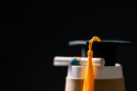 Concept education is business scholarship essential idea globalization, mortarboard students learn and study in universities and colleges master knowledge save involves financial management diplomaの写真素材