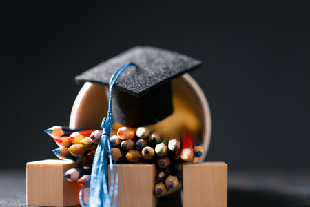 Concept education is business scholarship essential idea globalization, mortarboard students learn and study in universities and colleges master knowledge save involves financial management diplomaの写真素材