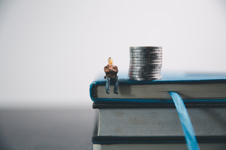 Concept education is business idea scholarship blur background essential globalization, saving students capital monthly learn and study in universities and advisor save involves books financial bannerの写真素材