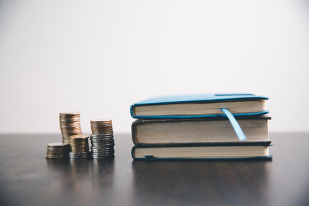 Concept education is business idea scholarship blur background essential globalization, saving students capital monthly learn and study in universities and advisor save involves books financial bannerの写真素材