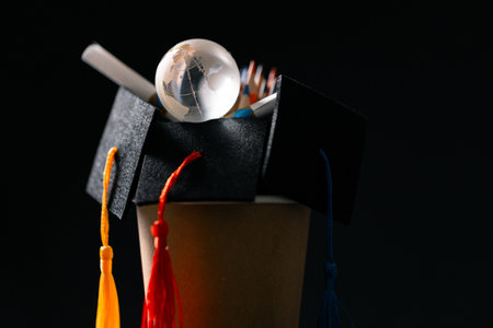 Concept education is business scholarship essential idea globalization, mortarboard students learn and study in universities and colleges master knowledge save involves financial management diplomaの写真素材