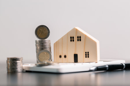 Business home concept involves strategic financial management money coin save bank real estate economic loan investment development growth encourage accountancy buy income stack investment economyの写真素材