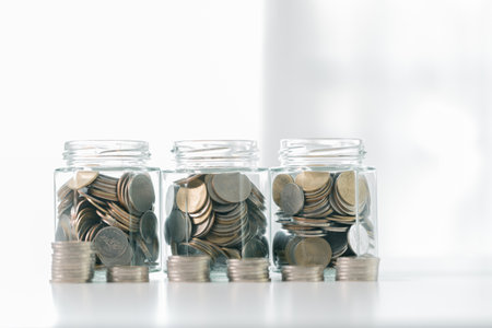 Business save money coin growth concept involves strategic financial management investment loan bank real estate economic development encourage buy income stack investment economy return accountancyの写真素材