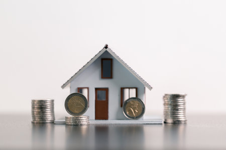 Business home concept involves strategic financial management money coin save bank real estate economic loan investment development growth encourage accountancy buy income stack investment economyの写真素材