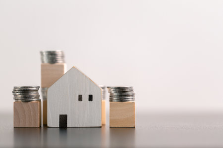 Business home concept involves strategic financial management money coin save bank real estate economic loan investment development growth encourage accountancy buy income stack investment economyの写真素材