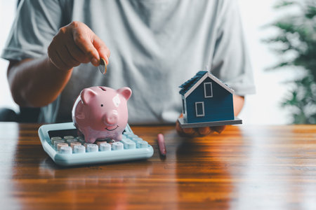 Business home concept involves strategic financial management money coin save bank real estate economic loan investment development growth encourage accountancy buy income stack investment economyの写真素材